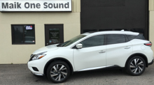 Black 2017 Nissan Murano with dark privacy tint installed in North Bay